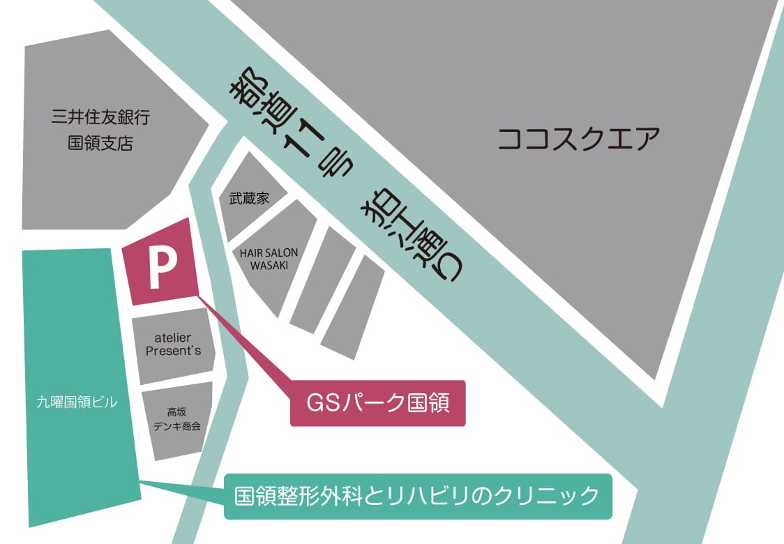三井住友銀行を右手に曲がったところ。奥に駐車場が見える